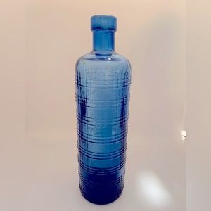 Cobalt blue glass bottle. Made in Spain. Recycled glass.